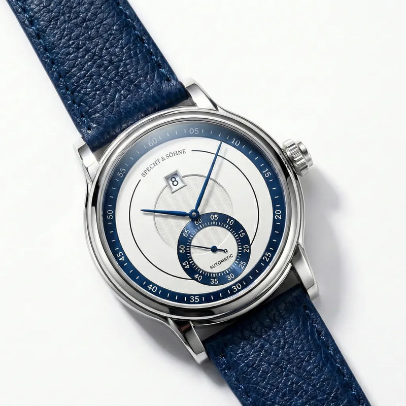 Mostrador branco opalino com ponteiros azul royal e acabamento sunburst - relógio branco masculino de luxo